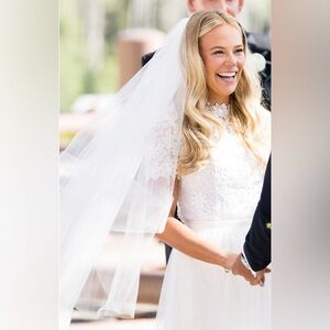 Tiered light ivory cathedral length veil